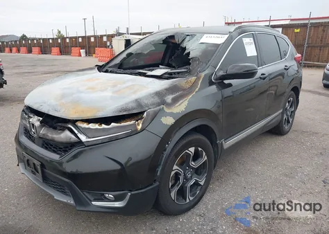2017 Honda Cr-V Touring z USA, uszkodzony, nr VIN 2HKRW2H90HH614677